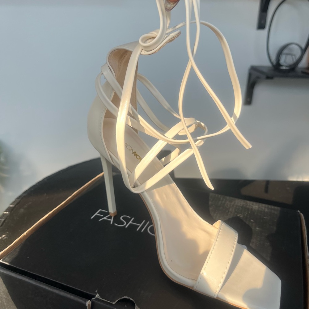 New. Cream sandal Sz 8.5